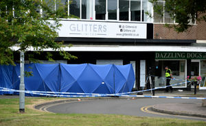 A police forensic tent outside Glitters on the High Street, where Mr Brindley died
