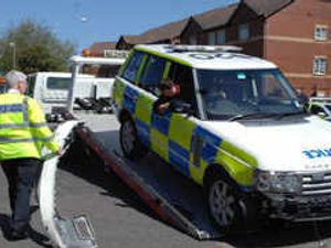 Supporting image for story: Police car is shunted into lorry