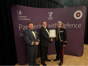 Pictured: Mike Smith (Headteacher) and Sqn Ldr Luke Horobin proudly share the certificate with Major Darren Knight who supported the school with this award.