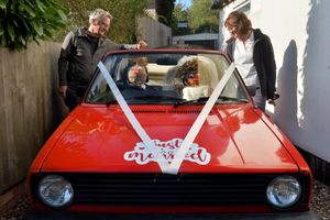 A pair of newly weds on route to their honeymoon