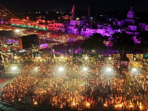 About 2.61 million oil lamps are lit along the Saryu river in India for Diwali