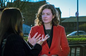 Sarah Coombes MP speaks with a constituent about road safety.