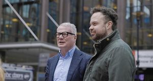 Mayor of the West Midlands Richard Parker with local illustrator Milan Topalović at the launch of the ‘You’re Bussing It!’ exhibition. PIC: WMCA.