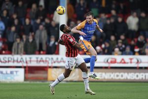Will Boyle heads clear for Shrewsbury Town