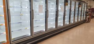 Empty freezer cabinets at Tesco Superstore, Penn Road