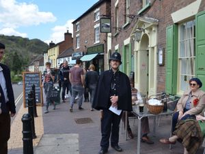 Supporting image for story: Re-enactors enjoy a tipple on 1940s Ironbridge pub crawl