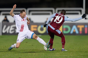 Aston Villa's Moussa Diaby, right, is challenged by Zrinjski's Nemanja Bilbija