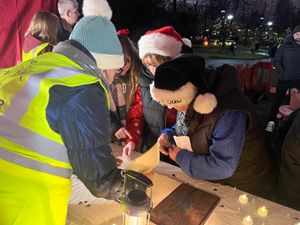 Viewing the Book of Lights at last year's service