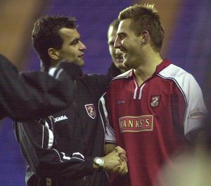 Roberto Martinez congratulates David Zdrillic after the win at Reading.