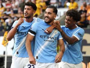 Supporting image for story: Manchester City begin title quest with convincing win against Wolves