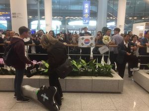 Being greeted at the airport in Seoul