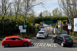 Cars queue at the Shaw Road Recycling Centre, Bushbury