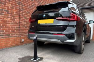 A bollard has been installed on the competition winner’s driveway.