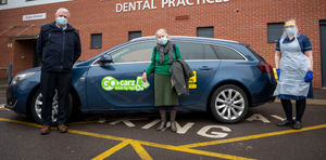 Go Carz Regional Director Graham Hoof with patient Sheila Mildoon, 85 and Kate Tatton, Lead Covid Nurse at Teldoc