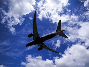 A plane lands on the southern runway at Heathrow Airport