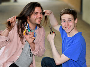 Supporting image for story: Teaching assistant to donate his long locks to fund for new sporting equipment