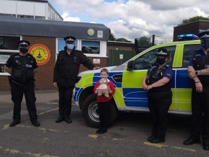 Supporting image for story: Police surprise girl who raised money for charity following organ transplant