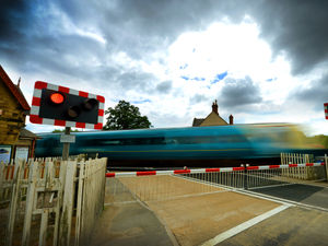 Supporting image for story: Man denies overtaking car and driving through level crossing as barriers came down