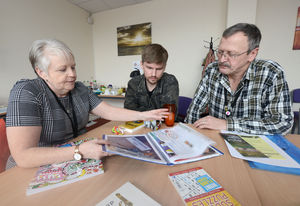Volunteers Jane Roberts and Toiny Harris, pictured with Matthew James at the Telford Autism Hub 