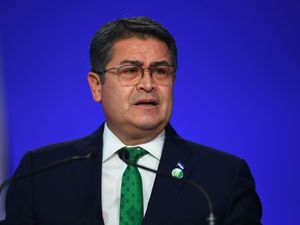 Supporting image for story: Former Honduras president freed after Trump pardon