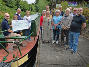 Supporting image for story: Generous former Goodyear workers fund narrow boat trips for MS and Alzheimers patients for next five years