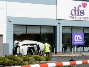 Supporting image for story: Reckless A5 racers jailed after car flipped and smashed into Cannock DFS shop