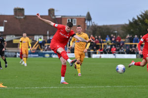 AFC Telford United striker Matty Stenson fires a shot goalwards