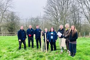 Members from Ludlow Town Council and Incredible Edible at Weyman Road planting the community orchard