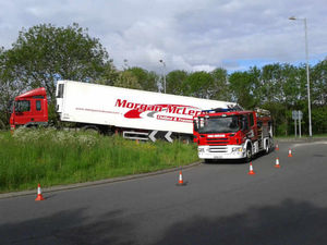 Supporting image for story: Pictures and video: Lorry crashes on to roundabout on the A5 near Oswestry