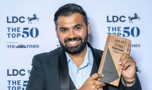 Manny Athwal - founder and CEO of Wolverhampton-based School of Coding & AI with his award