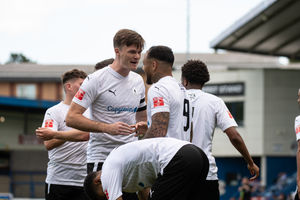 AFC Telford United players celebrate Montel Gibson (AFC Telford United Striker) runs down the swing and slots a low ball across net to make it 3-0 (Kieren Griffin)