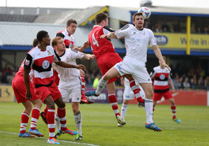 Dan Preston of AFC Telford United challenges for the ball at the is Telford corner