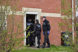 Search teams arrive at the townhouse in Winson Green