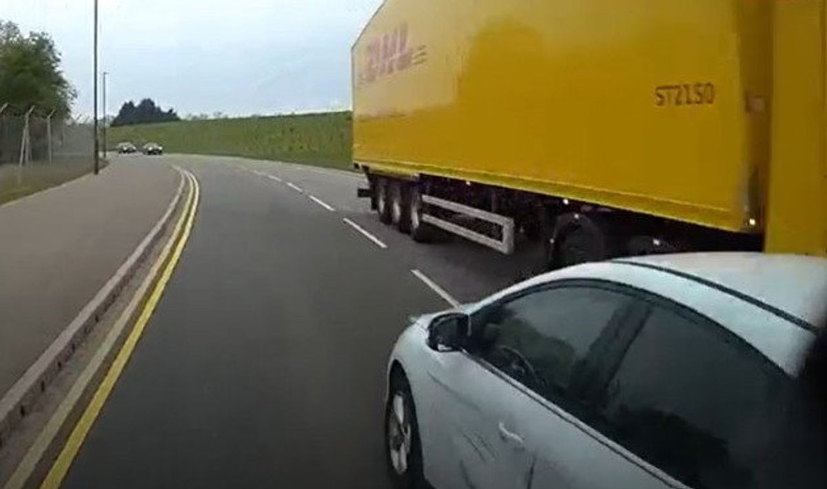 Heart-stopping moment West Midlands driver narrowly avoids head-on crash with HGV after overtaking van
