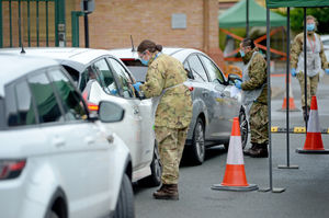 Army personnel testing drivers for coronavirus at a pop-up drive-through testing centre at Blakenall Village Centre in Walsall today. Image: Tim Thursfield/Express & Star