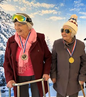 Residents Jennifer Morgan aged 85 and Marjorie Brownlee aged 93 with their medals