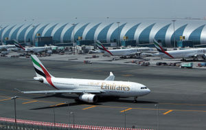 Emirates Airlines planes are parked at the Dubai international airport. (Photo: KARIM SAHIB/AFP via Getty Images)