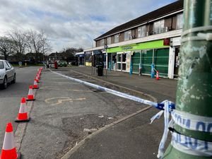 Police have taped off an area outside the shops on Mount Pleasant Road in Shrewsbury.