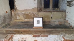 The altar within the Aedicule at Soulton Hall, featuring an original print of Albrecht Dürer's The Entombment (from The Small Passion, 1509) displayed at its centre.