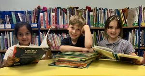 Year 2 pupils enjoying reading at Wilden All Saints CE Primary School