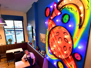 Supporting image for story: Cafe owner installs giant Walsall illumination in restaurant 