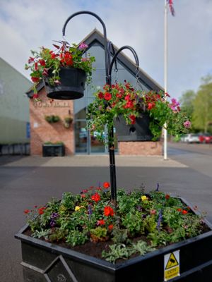 The town council provides 77 baskets, 29 mangers and 35 pole tops throughout the town. Picture: Market Drayton Town Council.