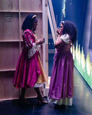 Georgia Iudica-Davies and Trinity chat behind the stage. Photo: Danny Kaan