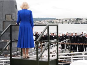 Supporting image for story: Queen given household gift during visit to submarine