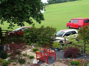 Cars parked on the school playing fields