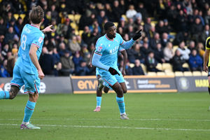 Daniel Kanu celebrates his goal for Walsall at Harrogate (Owen Russell)