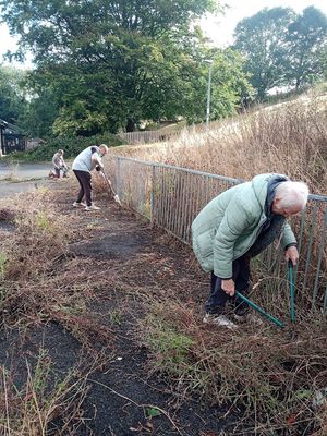 Work underway to tidy up the old tennis courts in Knighton