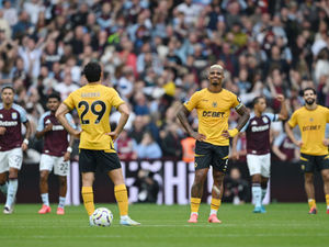 Mario Lemina and Goncalo Guedes dejected as Wolves lose at Villa (Photo by Shaun Botterill/Getty Images)