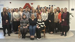 Axil's team celebrates the milestone 