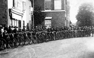 Boy scouts on parade with their bicycles in Church Street, Wellington, in 1914.